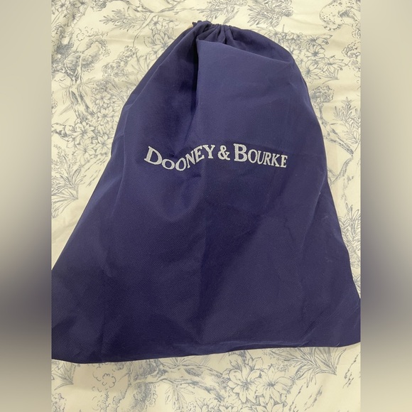 Beautiful Dooney & Bourke with Double Pockets.
Comes with crossbody strap. - Picture 2 of 9